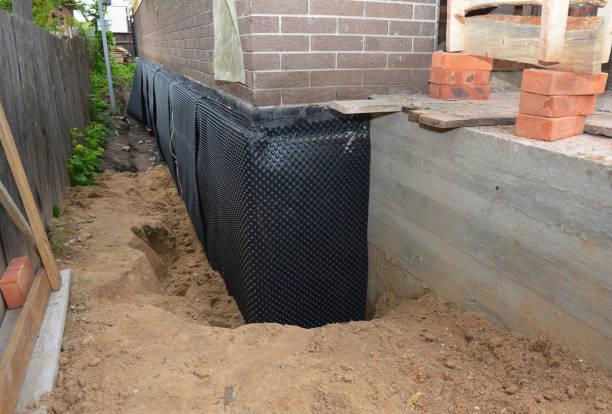 SJ Waterproofing Pros technician performing targeted Sump Pump Installation assessment in Sherwood, OR